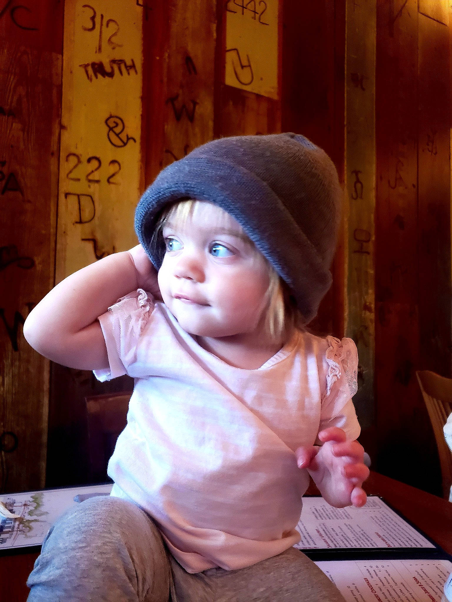 Penny is registered to the contest to win money with this photo: baby, baby_toddler_clothing, cap, cheek, child, clothing, fashion_accessory, flash_photography, fun, happy, hat, headgear, headwear, person, shorts, sitting, skin, sleeve, standing, t_shirt