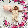 Kimber joined the competition — help win amazing prizes! baby, infant, plush_toy, pig, flower_pattern, blanket, floral, cute_outfit, headwear, white_socks, carpet, milestone, numbers, peaceful, lying_down, pink, green, purple, decorative, indoor