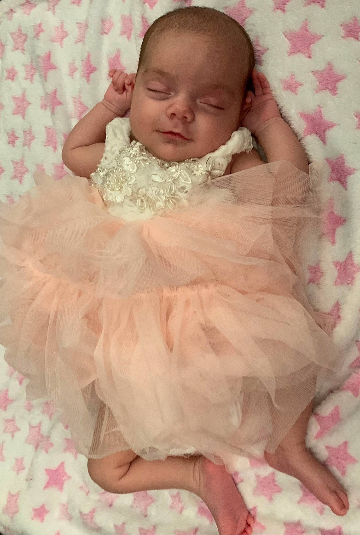 Mika is registered to the contest to win money with this photo: baby, baby_toddler_clothing, beauty, cheek, comfort, day_dress, dress, embellishment, eye, face, hair_accessory, happy, iris, pattern, peach, person, pink, shoulder, skin, sleeve