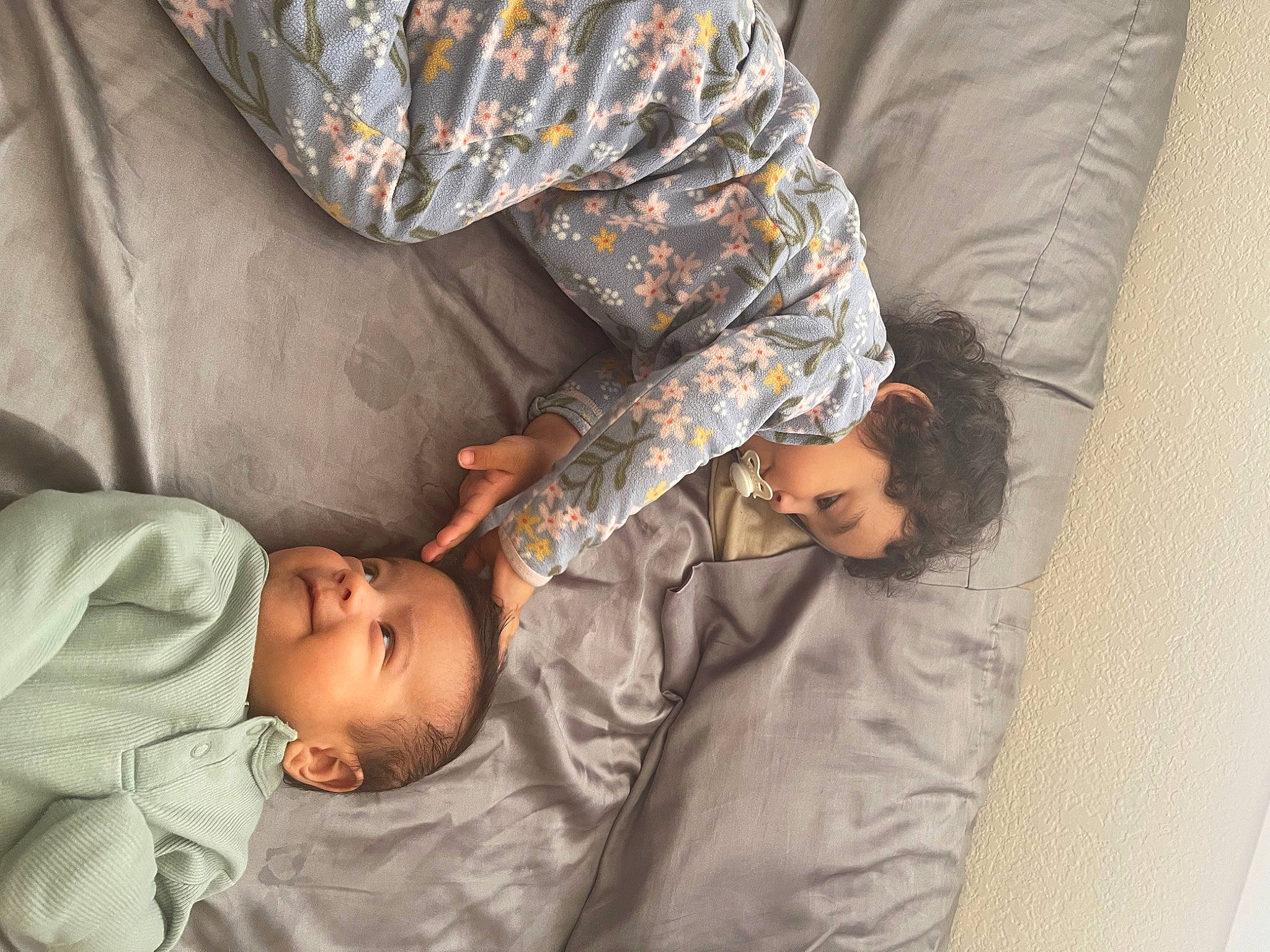 Evangeline is registered to the contest to win money with this photo: baby, bedtime, child, comfort, couch, elbow, gesture, human, human_leg, linens, nap, person, room, sitting, sleep, toddler, tree