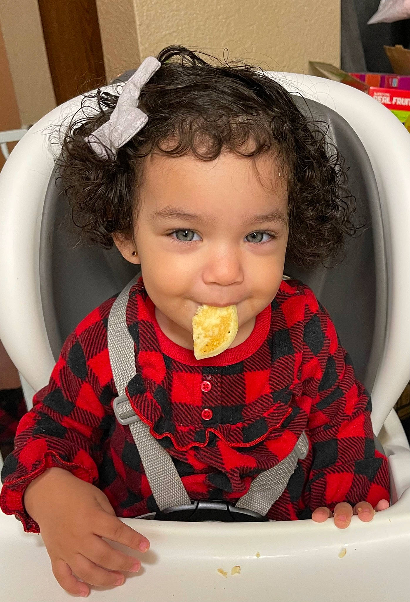 Evangeline joined the competition — help win amazing prizes! baby, baby_toddler_clothing, beauty, cheek, child, comfort_food, design, eyelash, facial_expression, food_craving, hair, hairstyle, head, pattern, person, plaid, sitting, skin, sleeve, sweetness