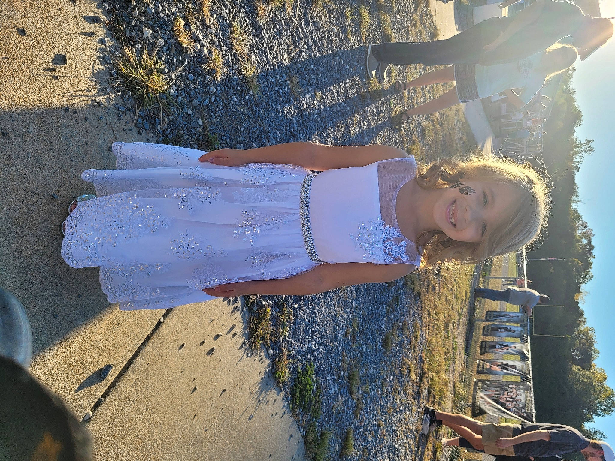 Sarah is registered to the contest to win money with this photo: azure, dress, elbow, electric_blue, fun, gesture, happy, human_leg, joy, landscape, leisure, pattern, people_in_nature, person, shadow, sky, smile, tints_and_shades, travel, tree