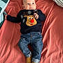 Gabriel a rejoint le concours — aidez-le/la à gagner de superbes lots ! baby, infant, child, blue_eyes, reindeer_sweater, jeans, booties, bed, bedding, blanket, portrait, cute, clothing, laying_down, indoor, young_child, smiling, holiday_sweater, red_nose, cozy