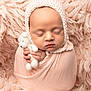 Paisley joined the competition — help win amazing prizes! newborn, baby, sleeping, blanket, knitted_bonnet, crocheted_toy, teddy_bear, soft_texture, peach_color, wrapped, closeup, infant, cute, portrait, peaceful, hand, cozy, studio, child, face