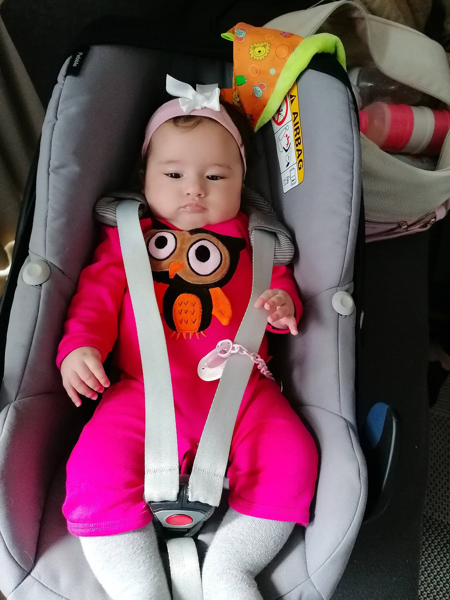 Mariana a rejoint le concours — aidez-le/la à gagner de superbes lots ! auto_part, baby, baby_carriage, baby_in_car_seat, baby_products, car_seat, car_seat_cover, comfort, finger, head_restraint, mouth, outerwear, person, personal_protective_equipment, pink, product, seat_belt, skin, smile, steering_wheel