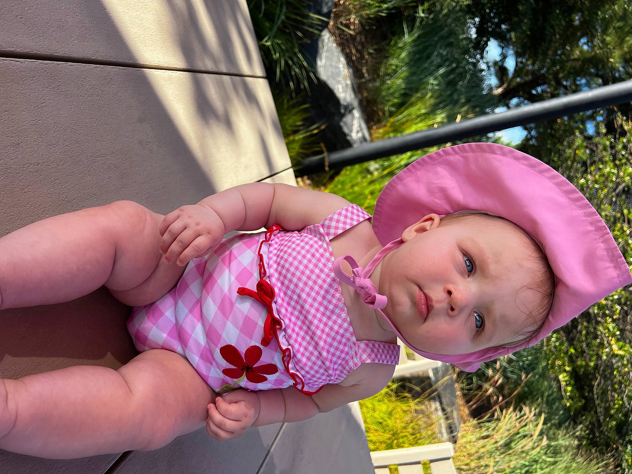 Nola joined the competition — help win amazing prizes! baby, baby_toddler_clothing, child, fun, gesture, grass, happy, hat, leisure, lip, magenta, person, pink, plant, recreation, skin, smile, sun_hat, thumb, toddler