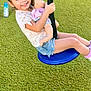 casual_clothing, child, daylight, doll, feet, fun, girl, grass, happy, leisure, outdoor, person, play, playground, shorts, smile, summer, swing, toy, tshirt
