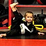Delilah joined the competition — help win amazing prizes! athlete, barefoot, black_mat, child, exercise, fitness, floor, gi, gym, indoor, kid, martial_arts, playful, pose, red_shelf, shelving, sports_equipment, training, white_belt, young