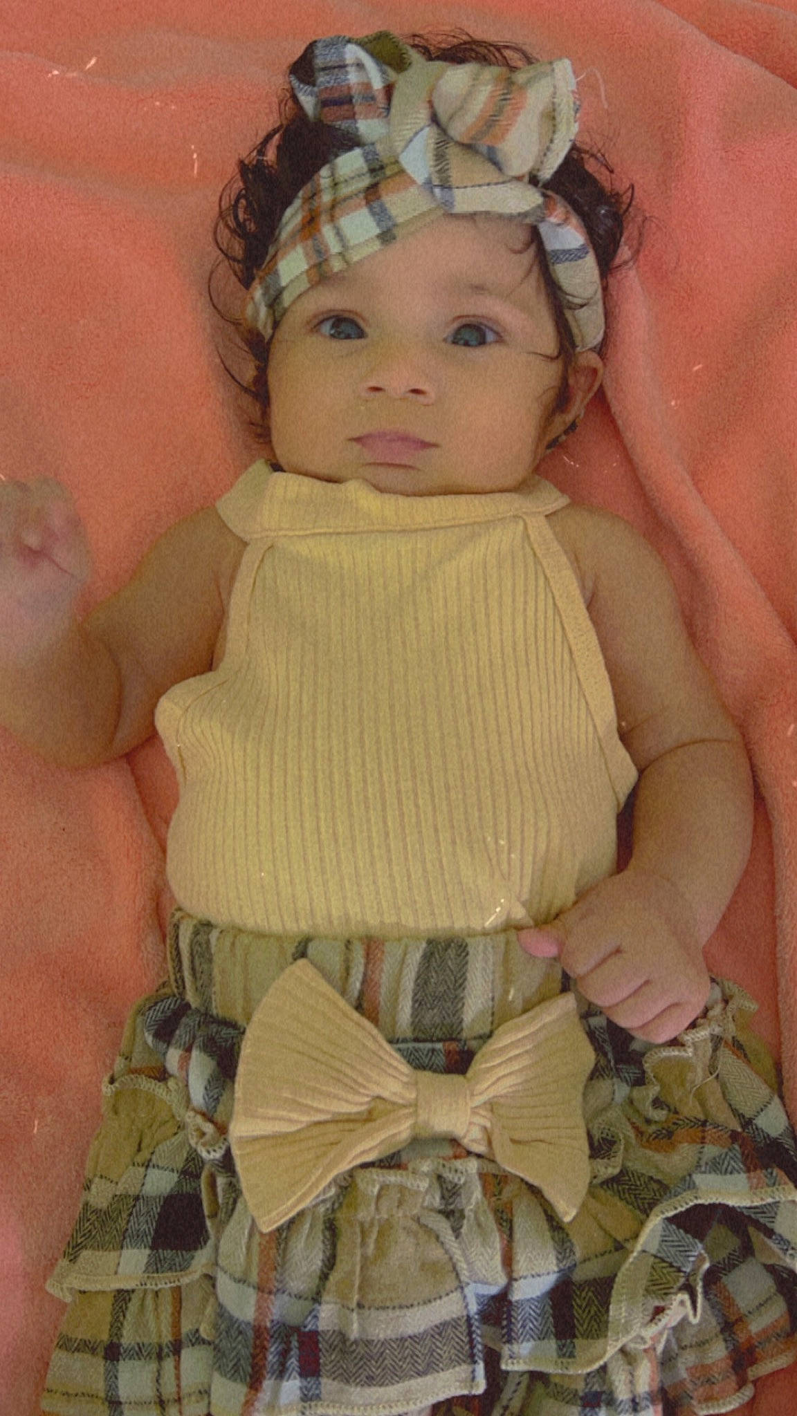 Avianna joined the competition — help win amazing prizes! baby, baby_products, baby_toddler_clothing, camouflage, cap, cheek, child, eyelash, fashion_accessory, headband, headgear, headpiece, headwear, iris, jewellery, linens, pattern, person, pink, skin