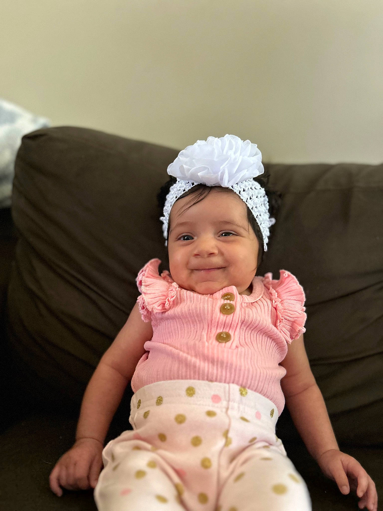 Avianna joined the competition — help win amazing prizes! baby, baby_toddler_clothing, cap, child, comfort, costume_hat, couch, fashion_accessory, happy, hat, head, headband, headwear, joy, pattern, person, pink, sitting, skin, sleeve