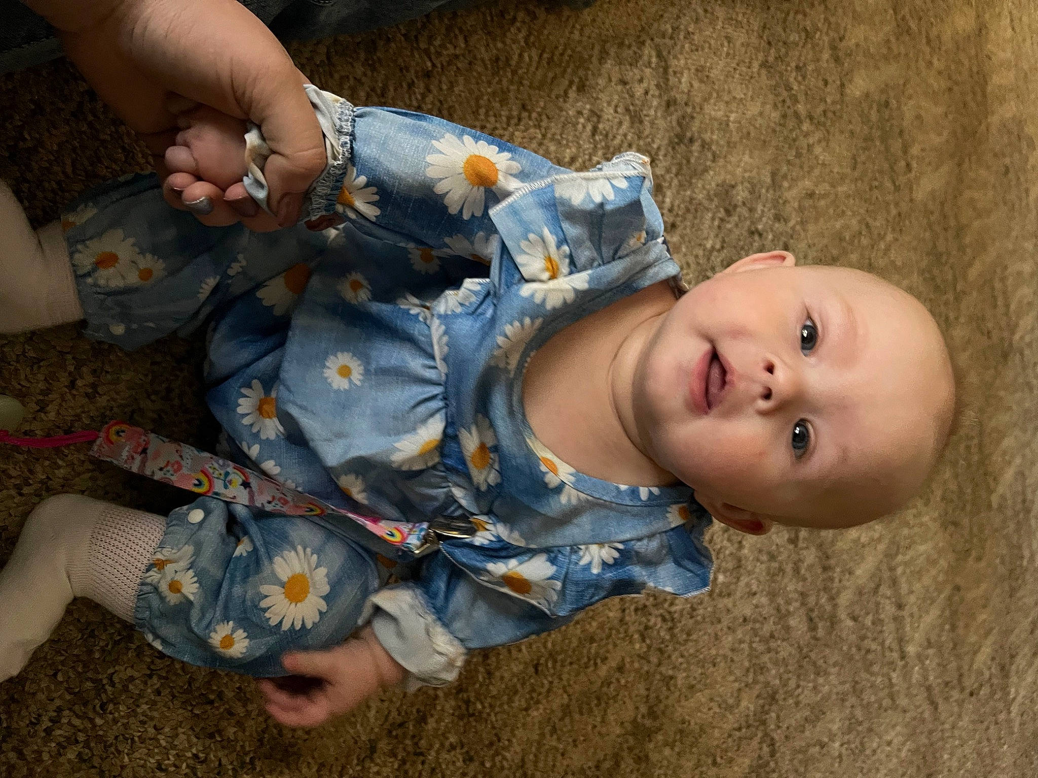 Josie is registered to the contest to win money with this photo: baby, baby_products, baby_toddler_clothing, cheek, child, fun, grass, hat, iris, lap, mouth, pattern, person, plant, portrait_photography, sitting, skin, thigh, toddler, tree