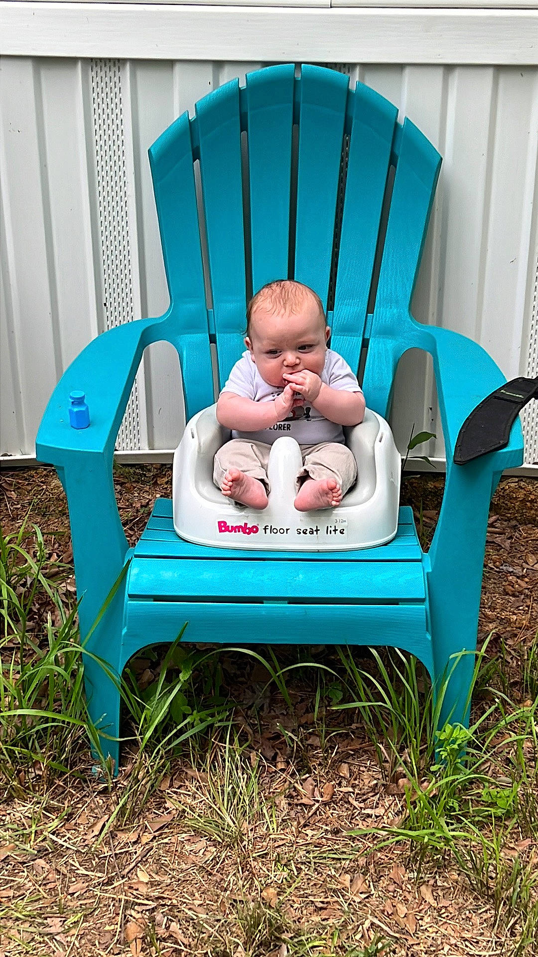 Troy joined the competition — help win amazing prizes! aqua, arm, baby, baby_products, baby_safety, baby_toddler_clothing, chair, child, comfort, dress, electric_blue, folding_chair, furniture, grass, happy, head, leisure, outdoor_furniture, person, sitting