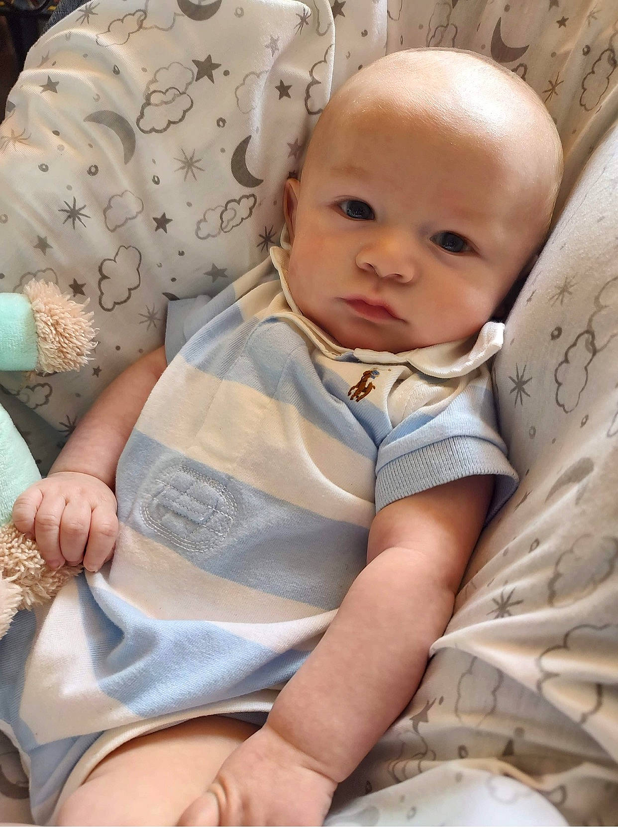 Braylon joined the competition — help win amazing prizes! baby, baby_toddler_clothing, cheek, child, chin, comfort, happy, linens, nose, pattern, person, portrait_photography, sitting, skin, sleeve, textile, toddler, vacation