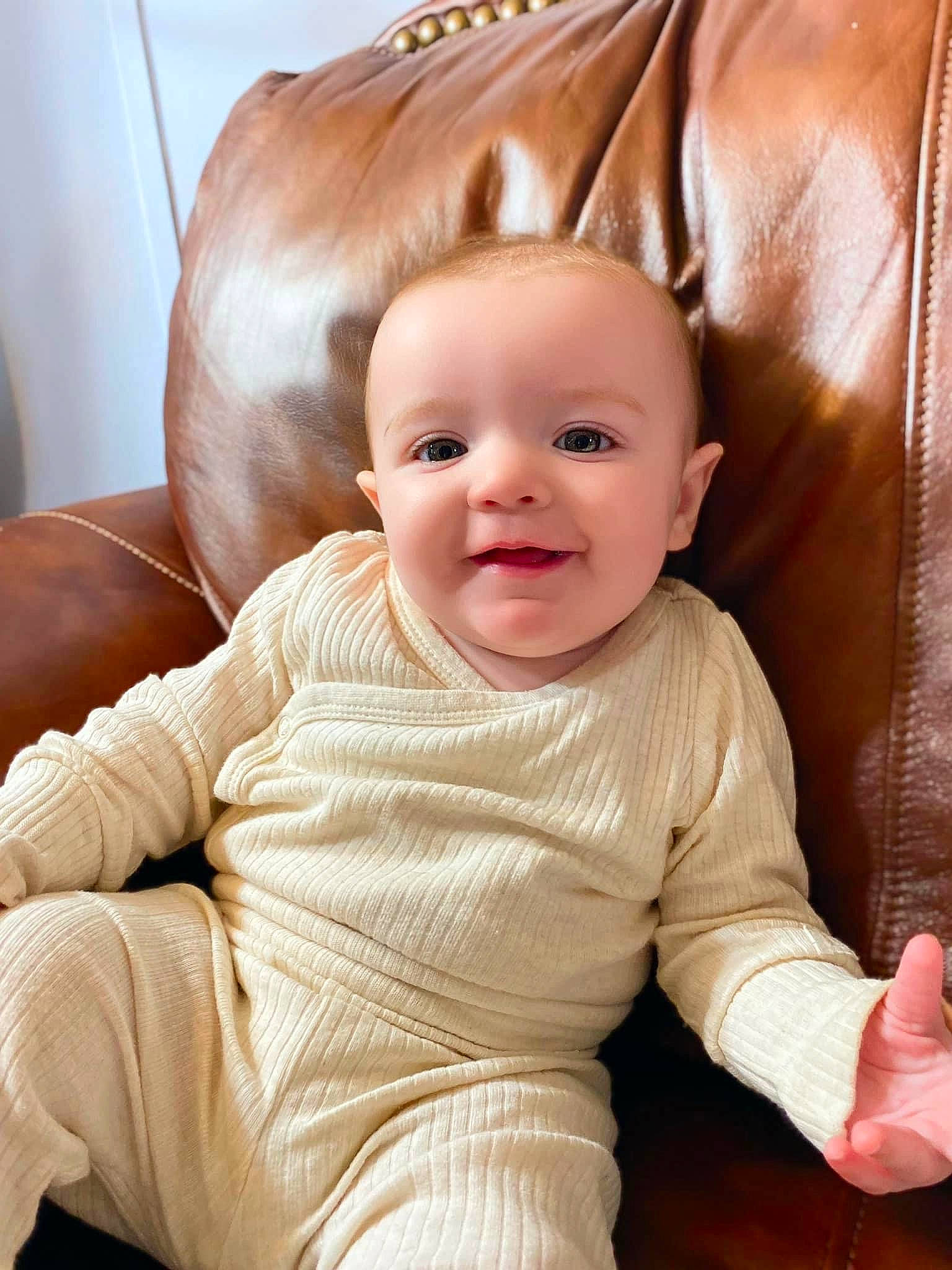 Arizona joined the competition — help win amazing prizes! baby, baby_toddler_clothing, cheek, chin, comfort, eye, facial_expression, happy, head, human_body, iris, lip, nose, outerwear, person, skin, sleeve, smile, textile, toddler