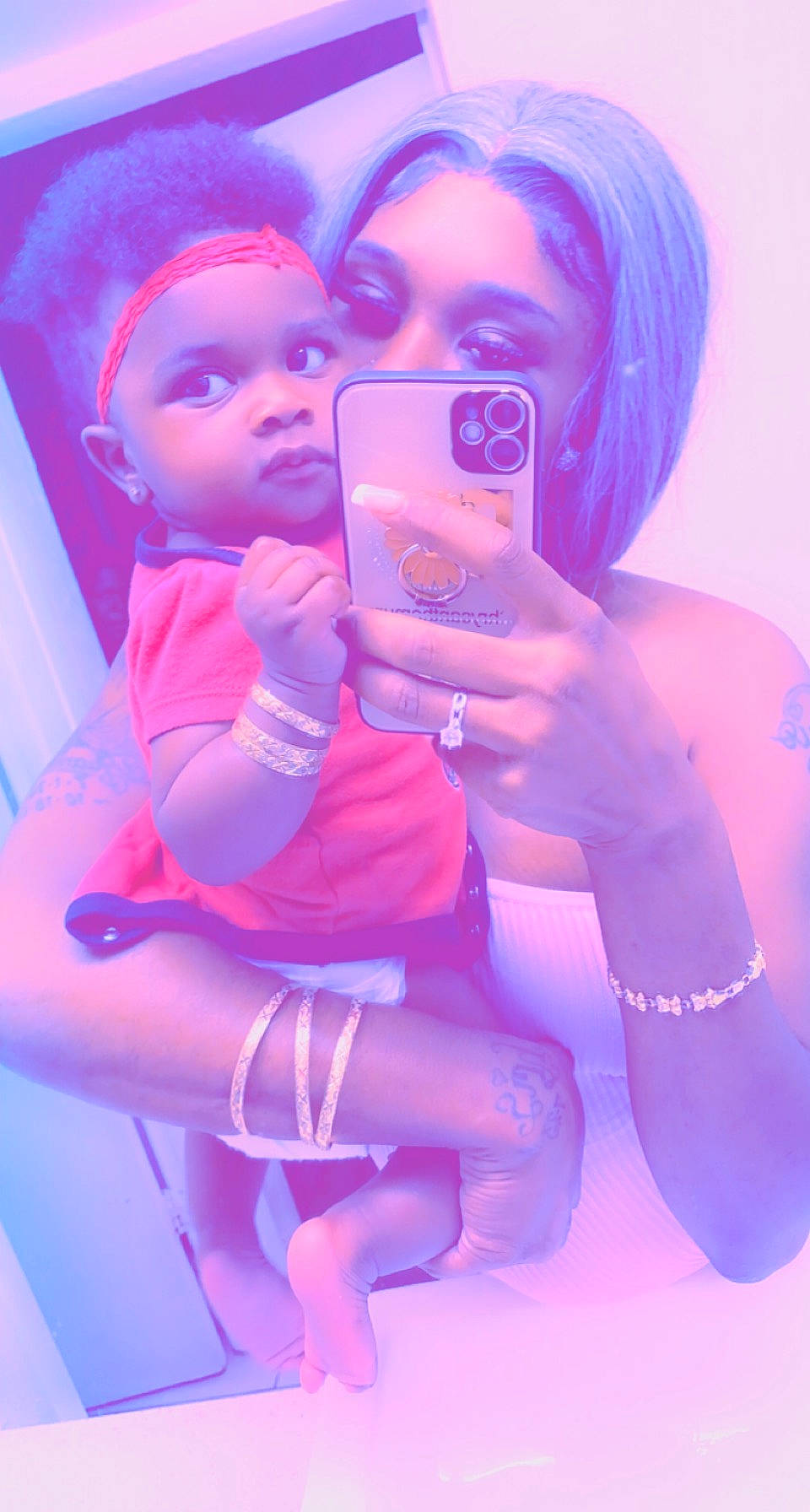 Taionna is registered to the contest to win money with this photo: azure, blue, chair, electric_blue, entertainment, eye, eyelash, finger, gadget, gesture, hand, happy, lip, magenta, person, pink, purple, red, skin, thumb