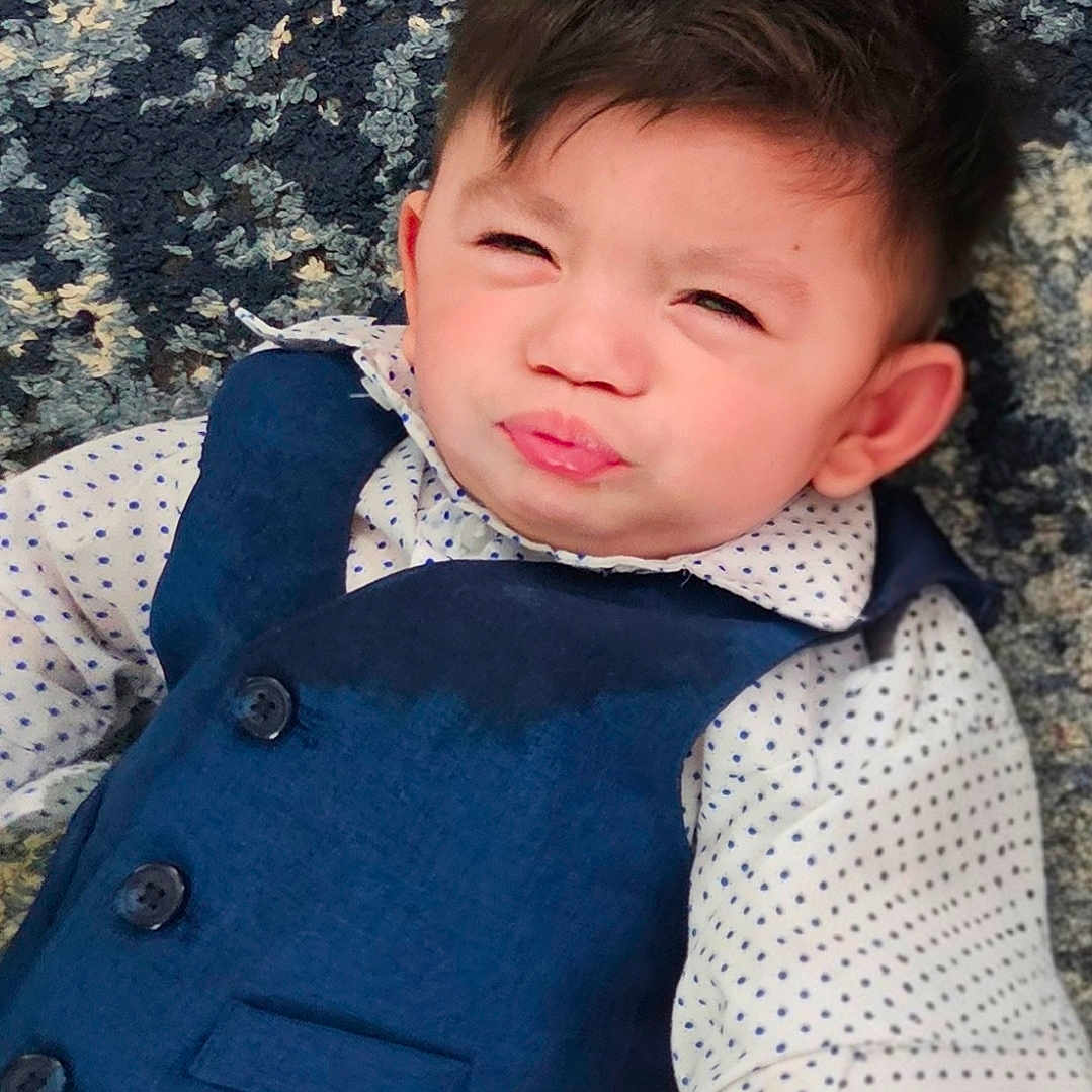 Autumn joined the competition — help win amazing prizes! child, kid, baby, face, portrait, clothing, vest, shirt, polka_dot, carpet, texture, expression, cute, indoor, young, person, fashion, sitting, head, funny_face