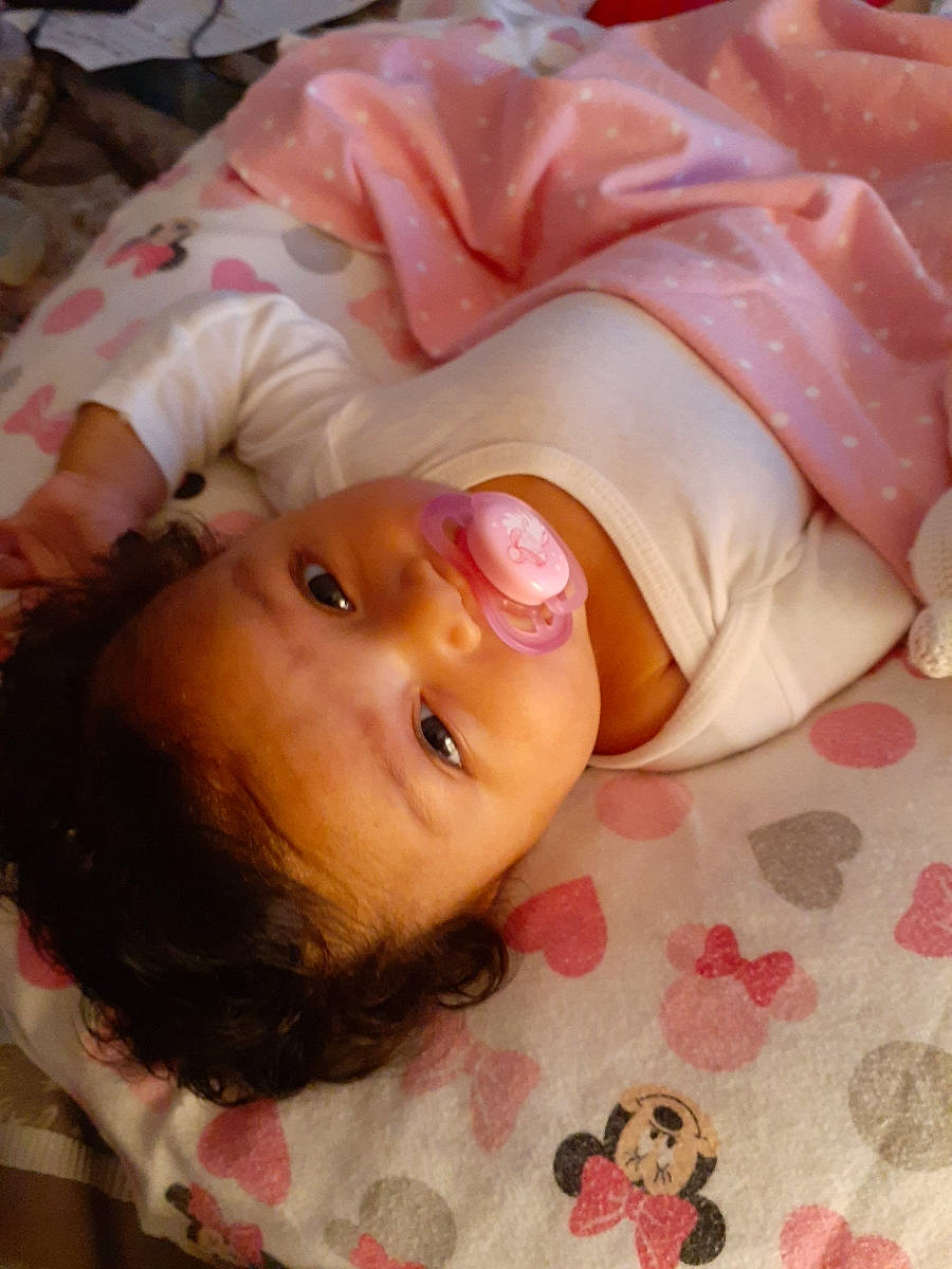 Stella is registered to the contest to win money with this photo: baby, baby_toddler_clothing, beauty, cheek, child, chin, eye, eyebrow, eyelash, face, happy, head, headgear, iris, lip, mouth, nose, person, pink, skin