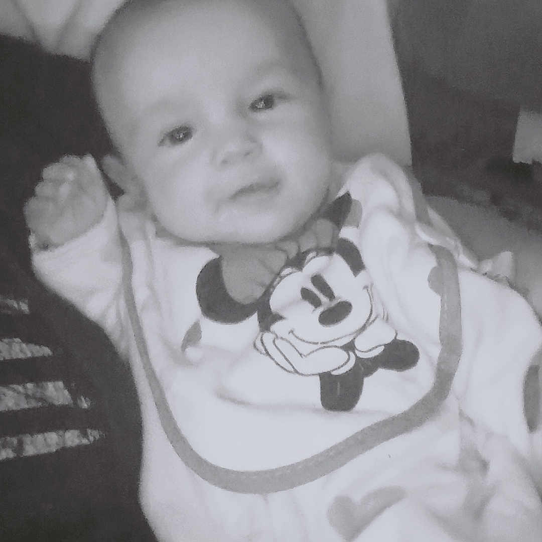 Addison is registered to the contest to win money with this photo: adult, baby, bed, blanket, clothing, cushion, face, furniture, happy, head, homedecor, male, man, newborn, person, photography, portrait, quilt, sleeping, smile
