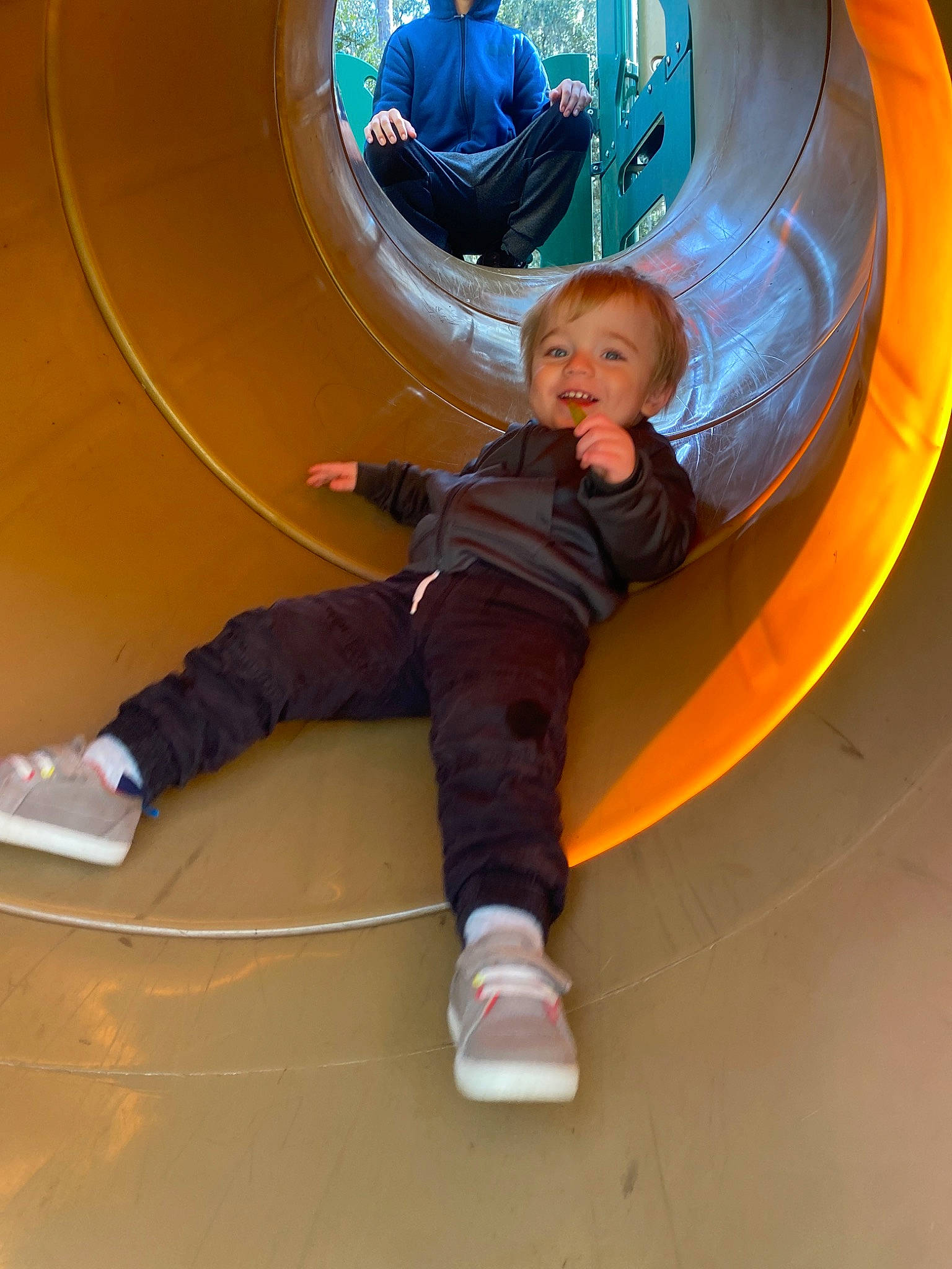 Jeice is registered to the contest to win money with this photo: blue, child, circle, comfort, electric_blue, flooring, fun, hardwood, head, leisure, outdoor_play_equipment, person, play, playground, recreation, shoe, sitting, stairs, symmetry, toddler