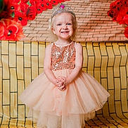 Aspen joined the competition — help win amazing prizes! child, girl, princess, dress, tiara, smile, posing, yellow_brick_road, background, happy, tights, ballerina, costume, portrait, standing, blonde, sparkly, cute, fashion, indoor