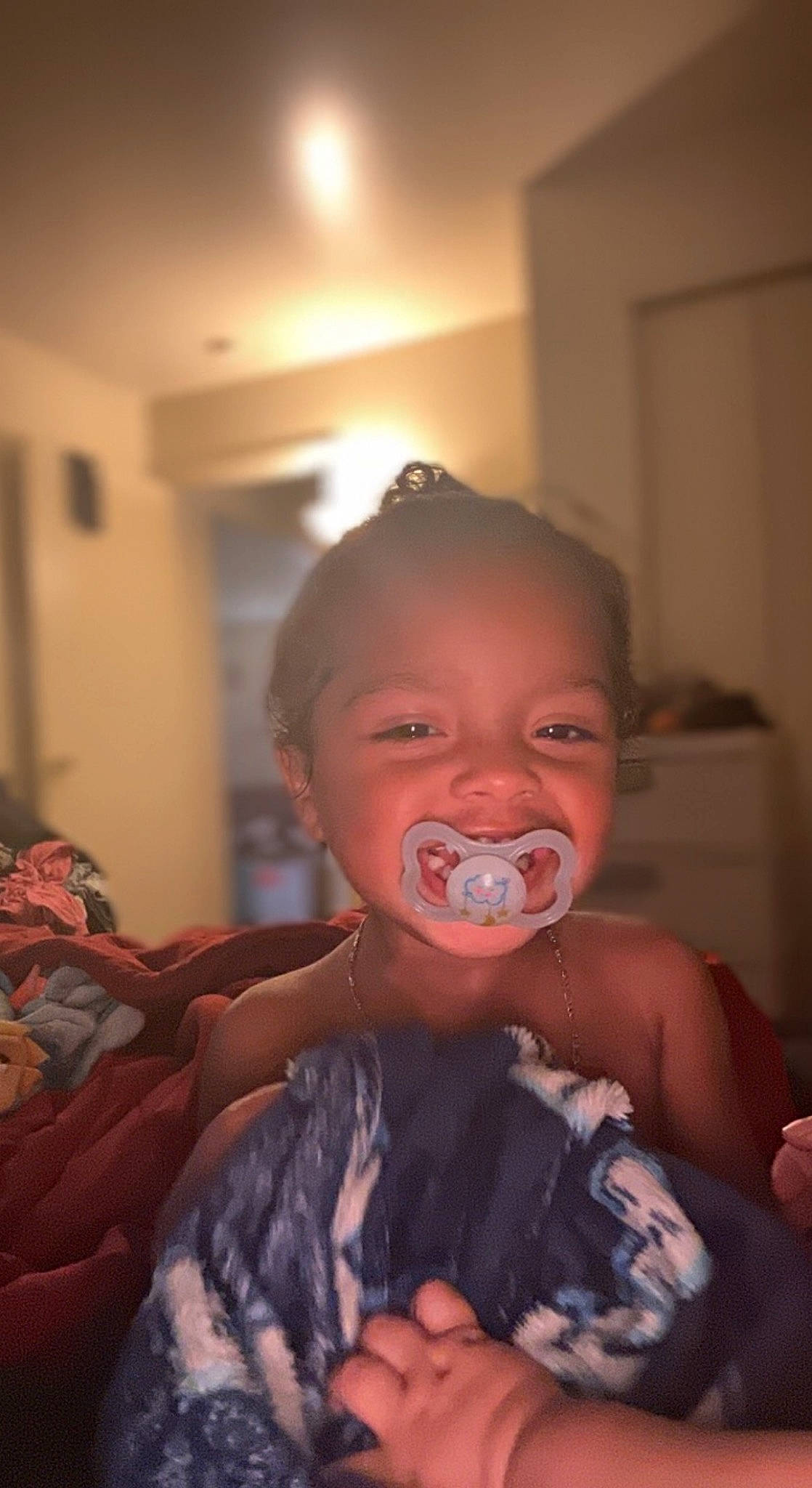 Raiden is registered to the contest to win money with this photo: baby, baby_products, baby_toddler_clothing, cheek, child, chin, eyebrow, fun, happy, iris, lip, mouth, nail, nose, person, room, sitting, skin, thumb, toddler