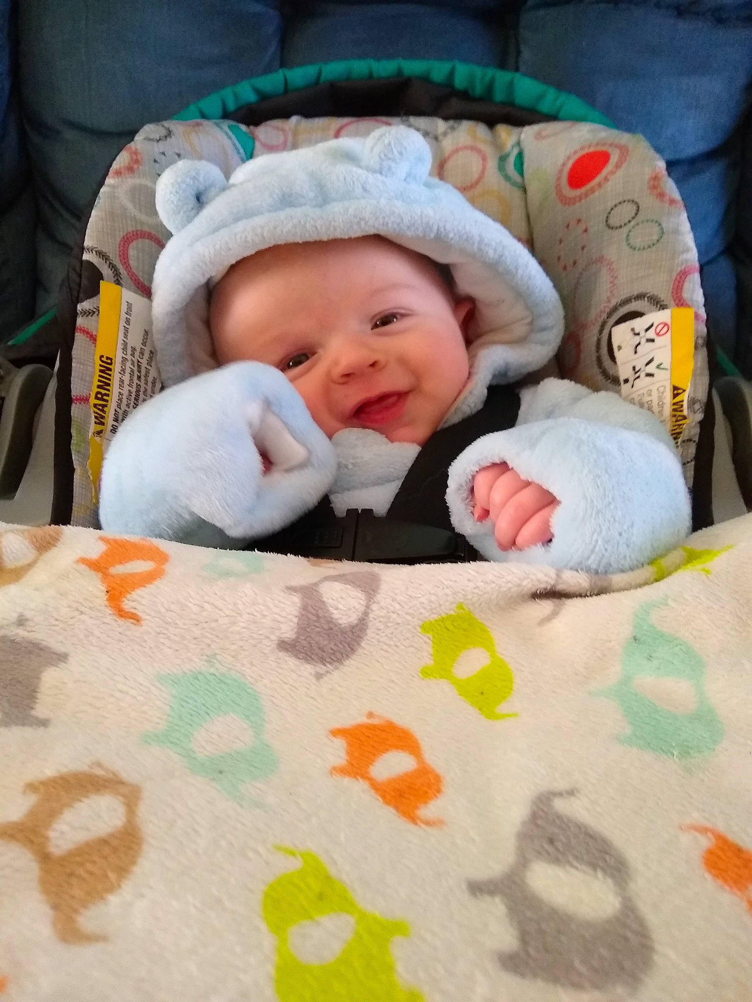 Wyatt is registered to the contest to win money with this photo: baby, baby_products, baby_sleeping, baby_toddler_clothing, beanie, cheek, child, comfort, face, grass, happy, head, headwear, knit_cap, linens, people, person, room, sleeve, smile