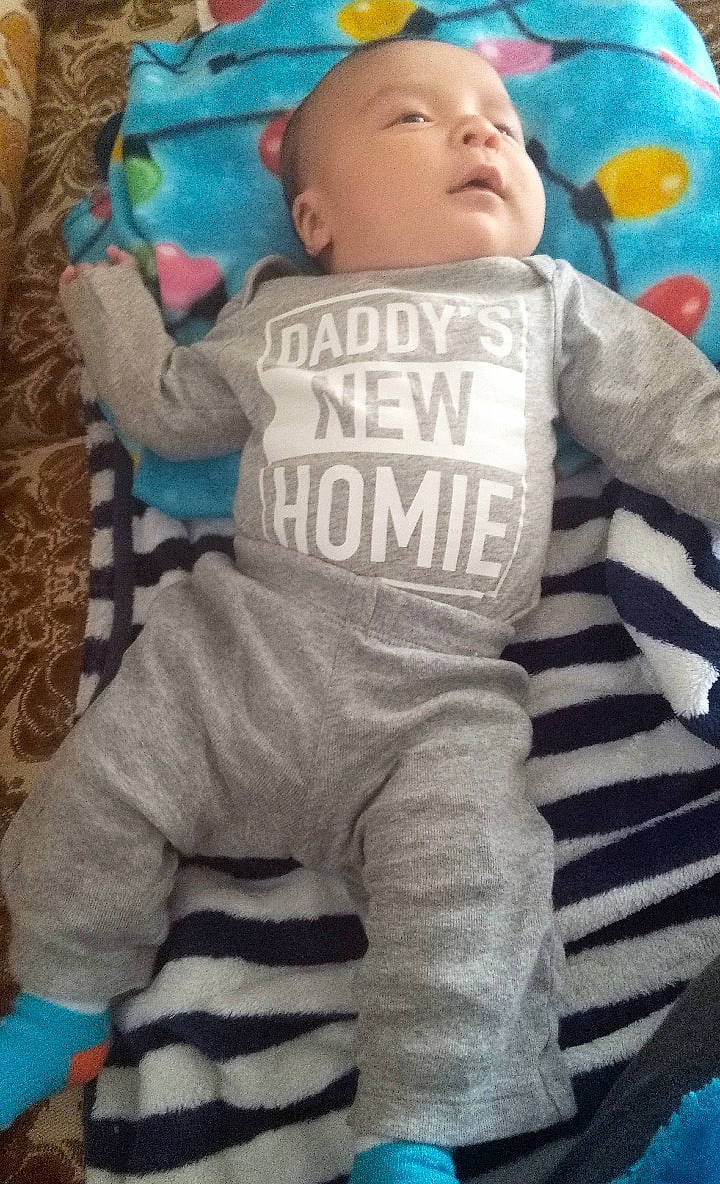 Omar is registered to the contest to win money with this photo: blue, boy, child, cool, day, fun, head, headgear, infant, nap, person, play, product, sitting, skin, sleep, textile, toddler