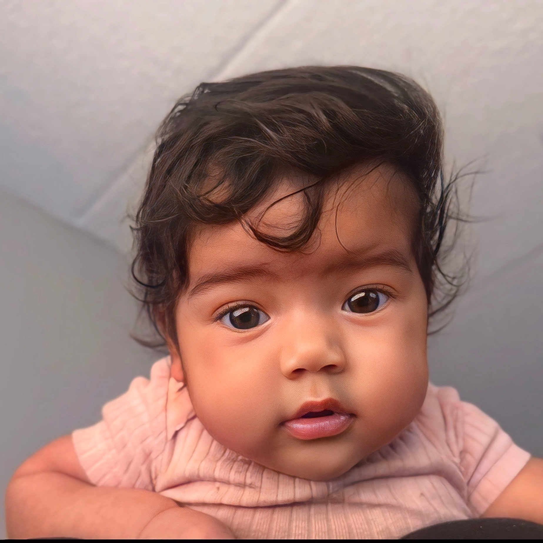 Innocence joined the competition — help win amazing prizes! baby, big_eyes, child, close_up, curly_hair, cute, expression, face, head, human, indoor, infant, innocent, looking_at_camera, person, pink_clothing, portrait, skin, soft_lighting, young_child