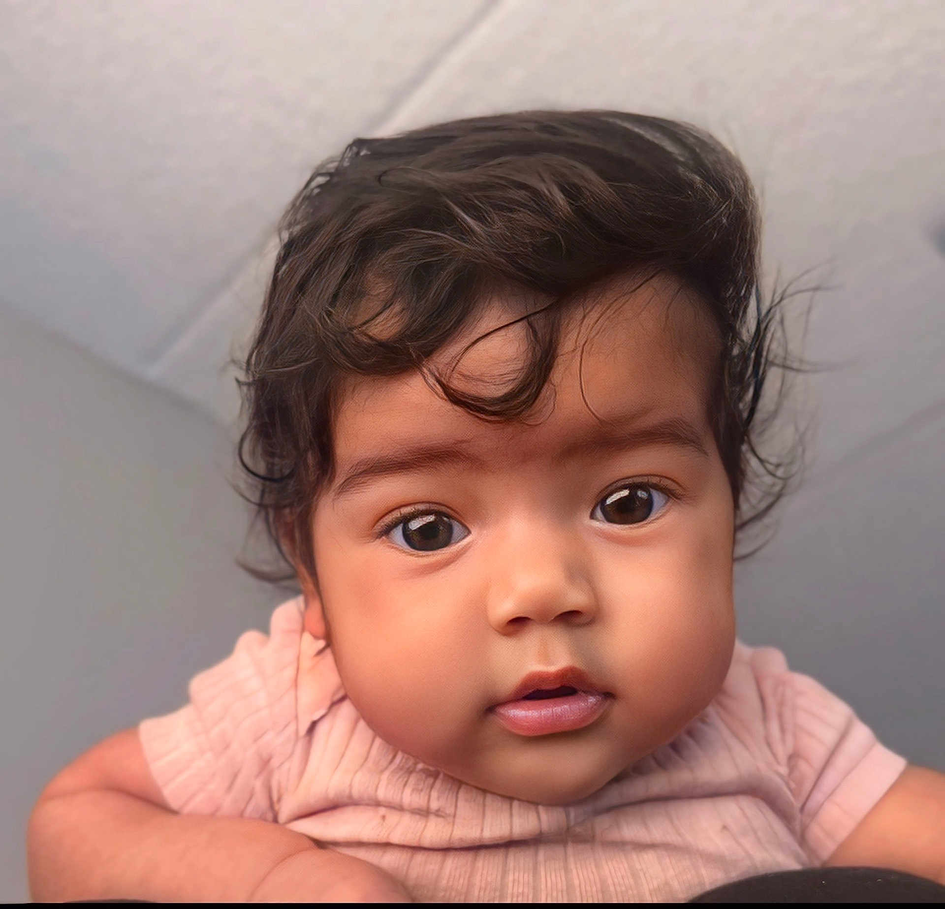 Innocence joined the competition — help win amazing prizes! baby, child, portrait, face, curly_hair, big_eyes, pink_clothing, close_up, innocent, cute, soft_lighting, indoor, person, infant, young_child, expression, looking_at_camera, skin, head, human