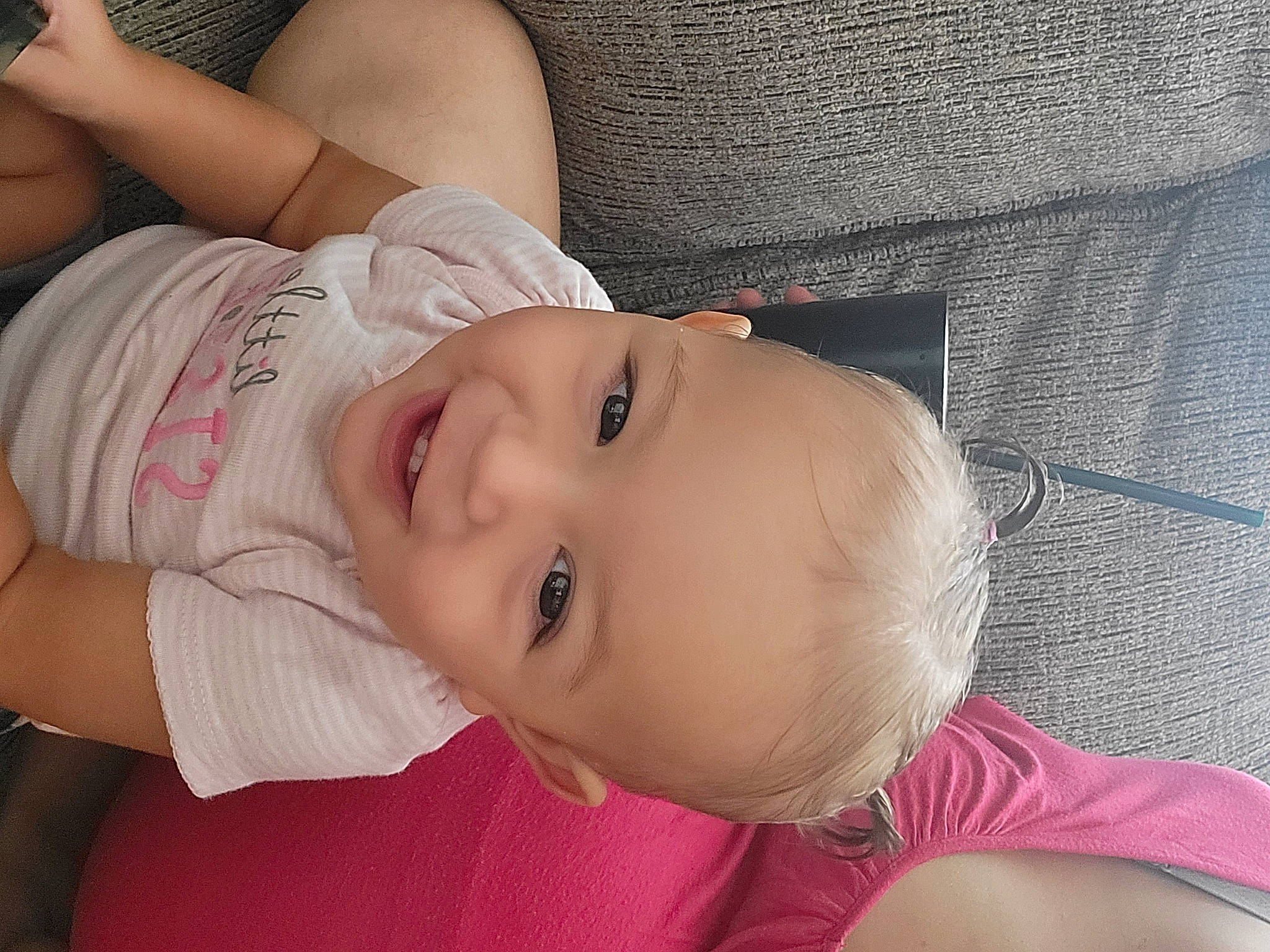 Kyleigh is registered to the contest to win money with this photo: baby_toddler_clothing, cheek, chest, comfort, eye, eyebrow, eyelash, hat, head, headgear, joint, joy, lip, mouth, neck, nose, person, pink, plant, shoulder