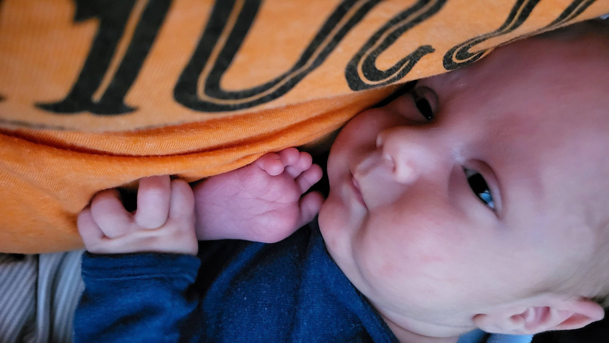 Skylar is registered to the contest to win money with this photo: baby, baby_toddler_clothing, cheek, child, close_up, comfort, eyelash, facial_expression, finger, gesture, happy, lip, mouth, nail, nose, peach, person, skin, smile, thumb