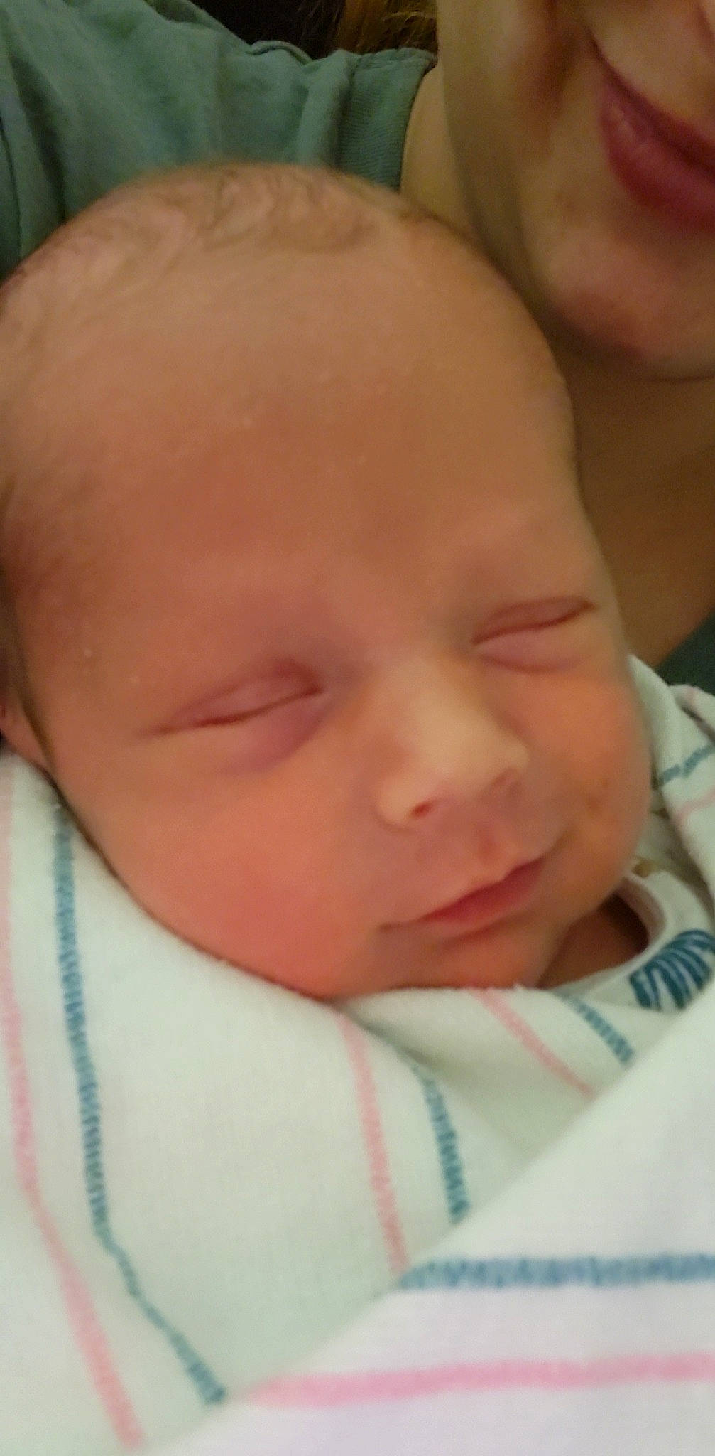 Skylar is registered to the contest to win money with this photo: baby, baby_toddler_clothing, bedtime, cheek, child, close_up, comfort, ear, eye, eyebrow, eyelash, forehead, happy, iris, lip, mouth, nose, person, skin, thumb