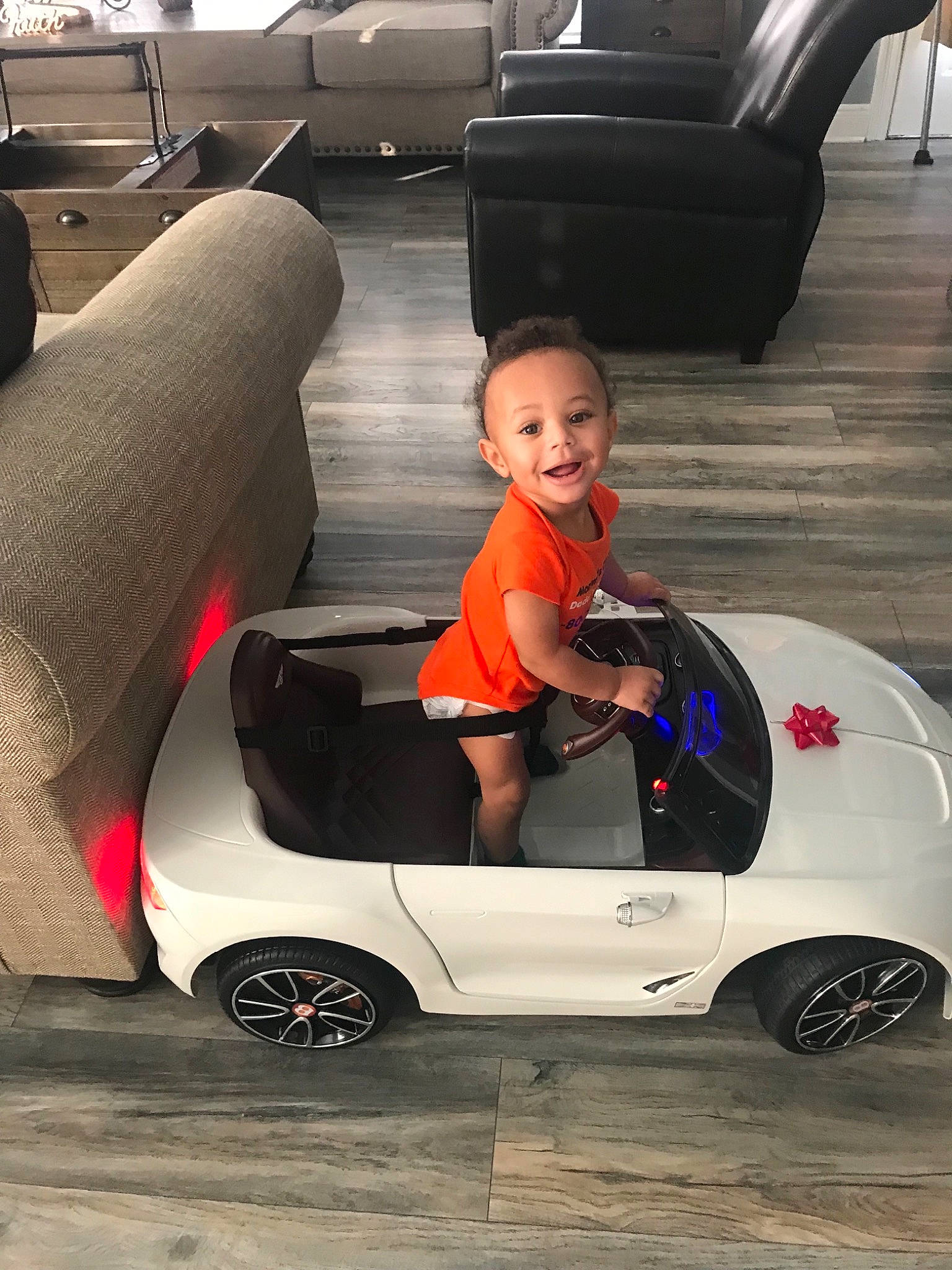 Brendon joined the competition — help win amazing prizes! automotive_design, automotive_exterior, car, driving, fun, land_vehicle, luxury_vehicle, motor_vehicle, person, personal_luxury_car, sports_car, supercar, toddler, vehicle, vehicle_door