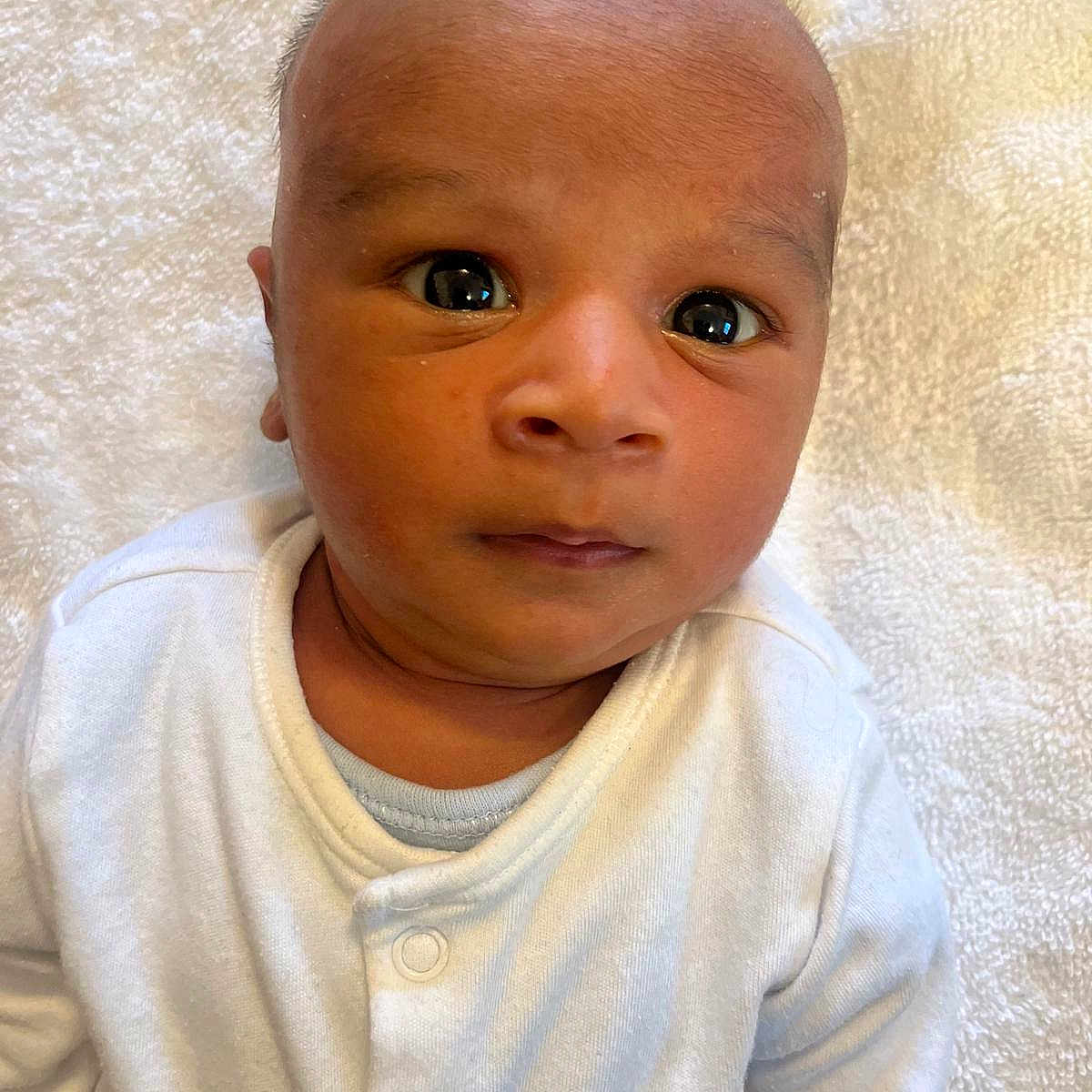 Sufyan is registered to the contest to win money with this photo: accessories, baby, bodypart, clothing, earring, face, hair, happy, head, jewelry, neck, newborn, person, photography, portrait, selfie, shoulder, skin, sleeve, smile