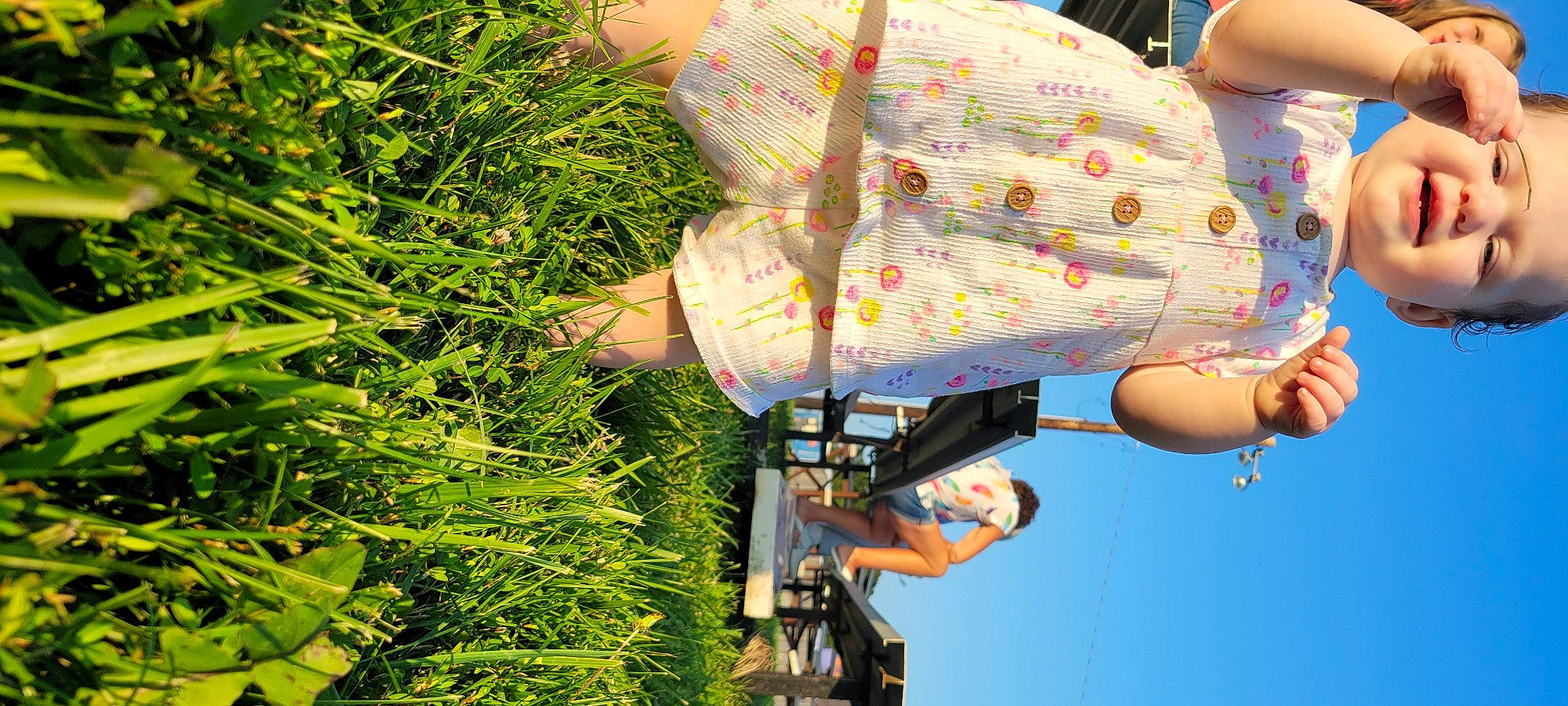 Lyla joined the competition — help win amazing prizes! adventure, fun, grass, groundcover, happy, headwear, leaf, leisure, organism, pattern, people_in_nature, person, plant, pole, recreation, rope, sky, spring, street_fashion, tartan