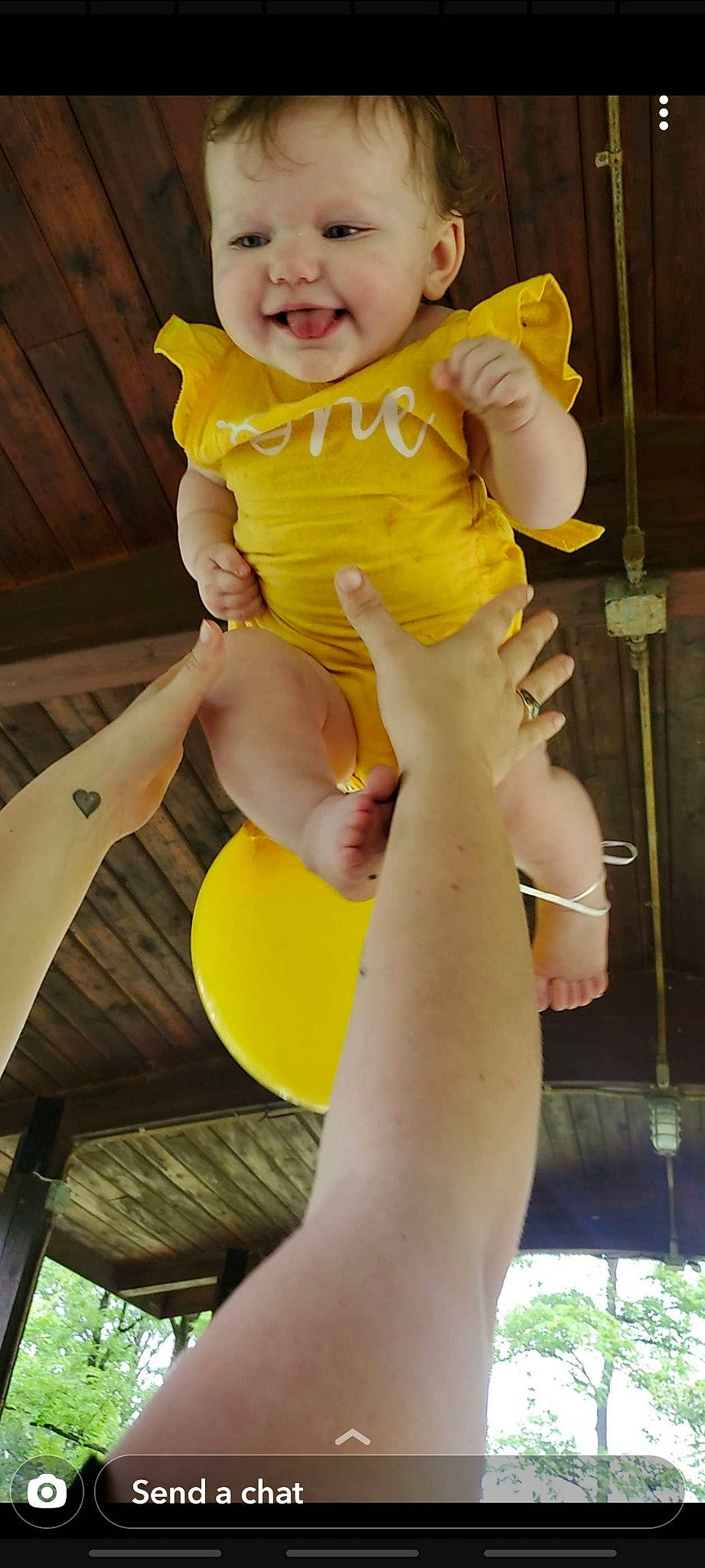 Lyla joined the competition — help win amazing prizes! baby, baby_products, baby_toddler_clothing, child, foot, fun, gesture, happy, human_leg, knee, leisure, person, photograph, recreation, sitting, sleeve, smile, thigh, toddler, white