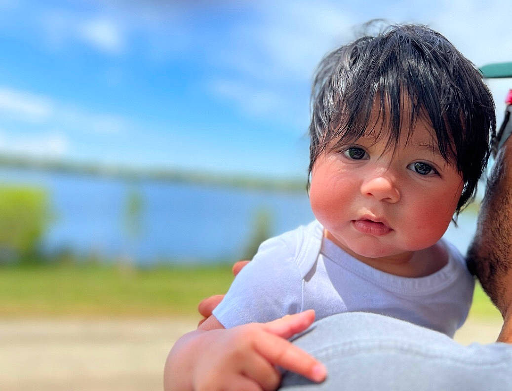 Darius joined the competition — help win amazing prizes! baby, baby_toddler_clothing, cloud, eye, finger, fun, gesture, grass, grassland, happy, leisure, people_in_nature, person, portrait_photography, recreation, sitting, sky, thumb, toddler, travel