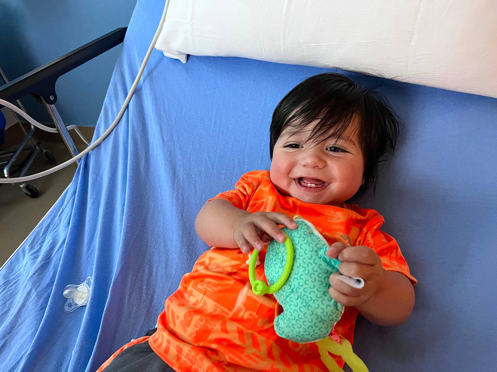 Darius joined the competition — help win amazing prizes! baby, baby_products, baby_toddler_clothing, child, comfort, couch, event, fun, hand, happy, joy, leisure, linens, person, play, product, room, sitting, sleeve, smile