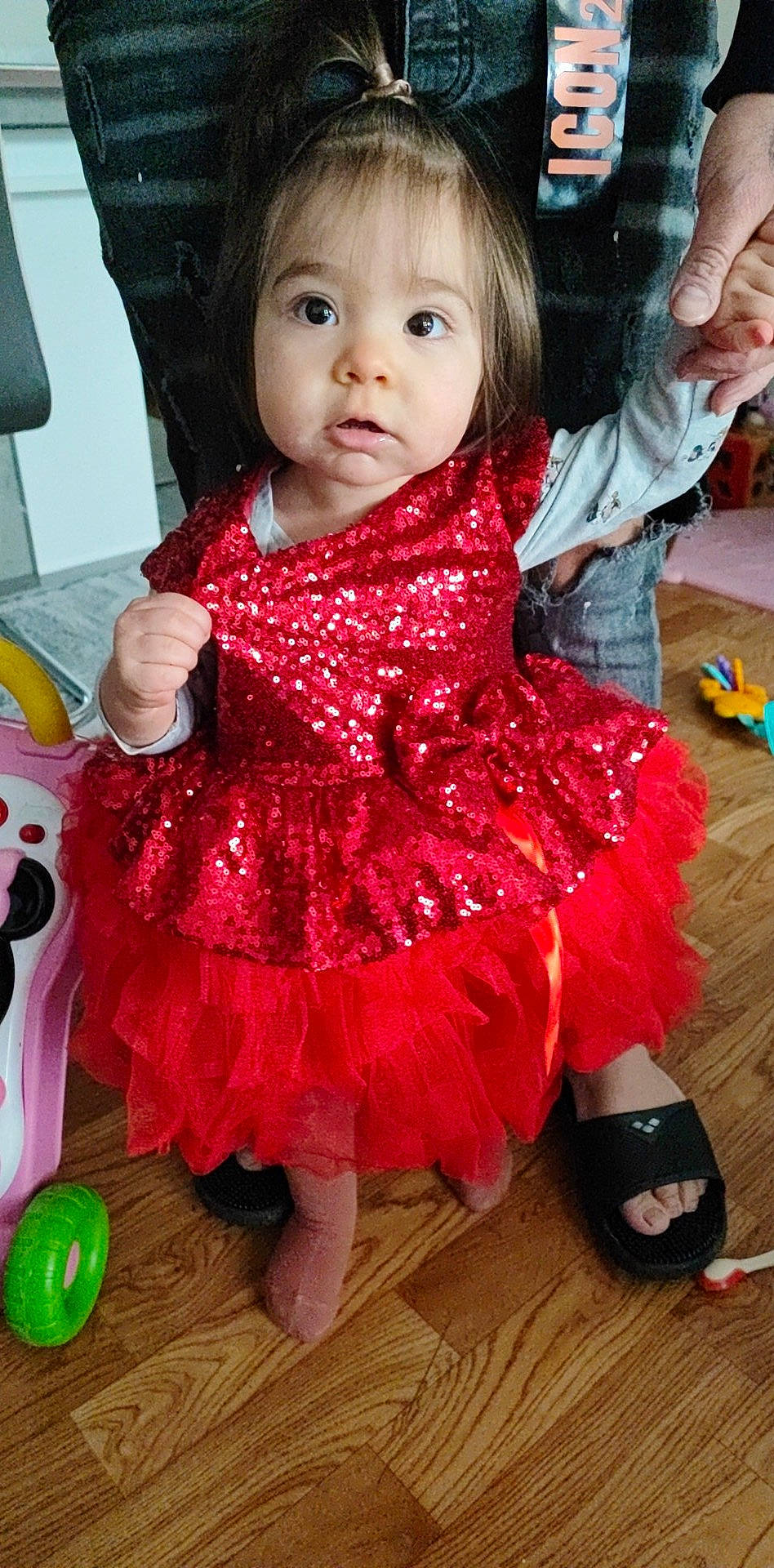 Keysha participe au concours pour gagner de l'argent avec cette photo : arm, baby, baby_toddler_clothing, cheek, child, clothing, day_dress, dress, embellishment, fashion_accessory, flooring, fun, happy, magenta, outerwear, pattern, person, pink, skin, sleeve