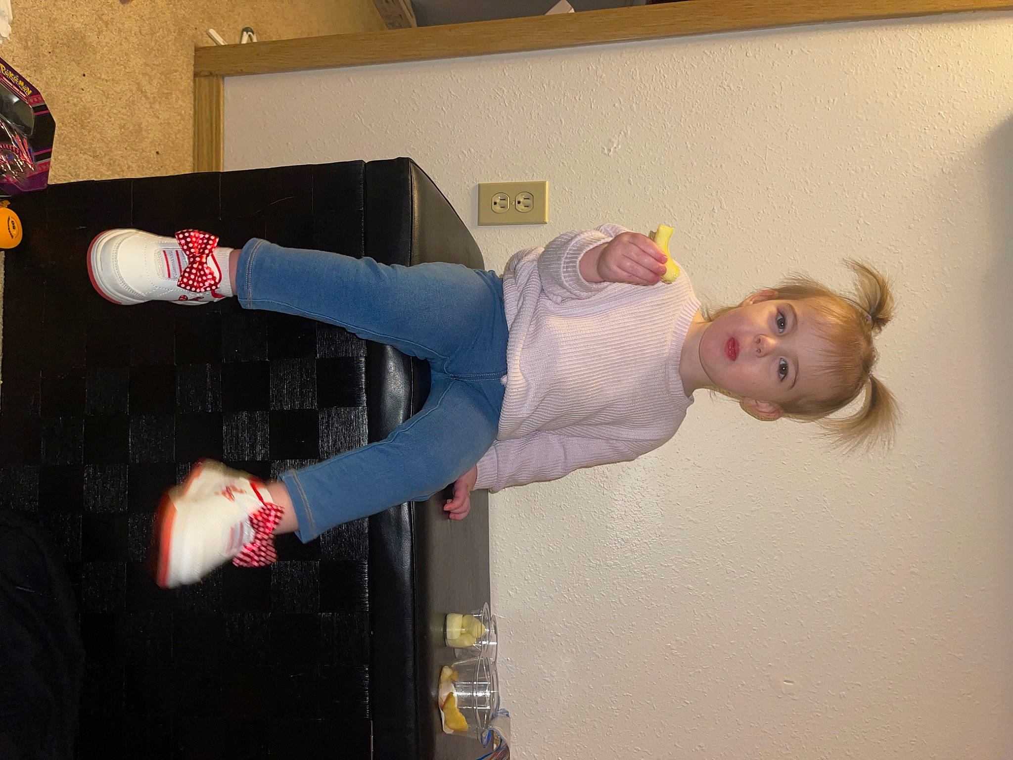 Evalyn is registered to the contest to win money with this photo: arm, carmine, elbow, fun, glove, human_leg, knee, person, room, sleeve, sock, sportswear, thigh