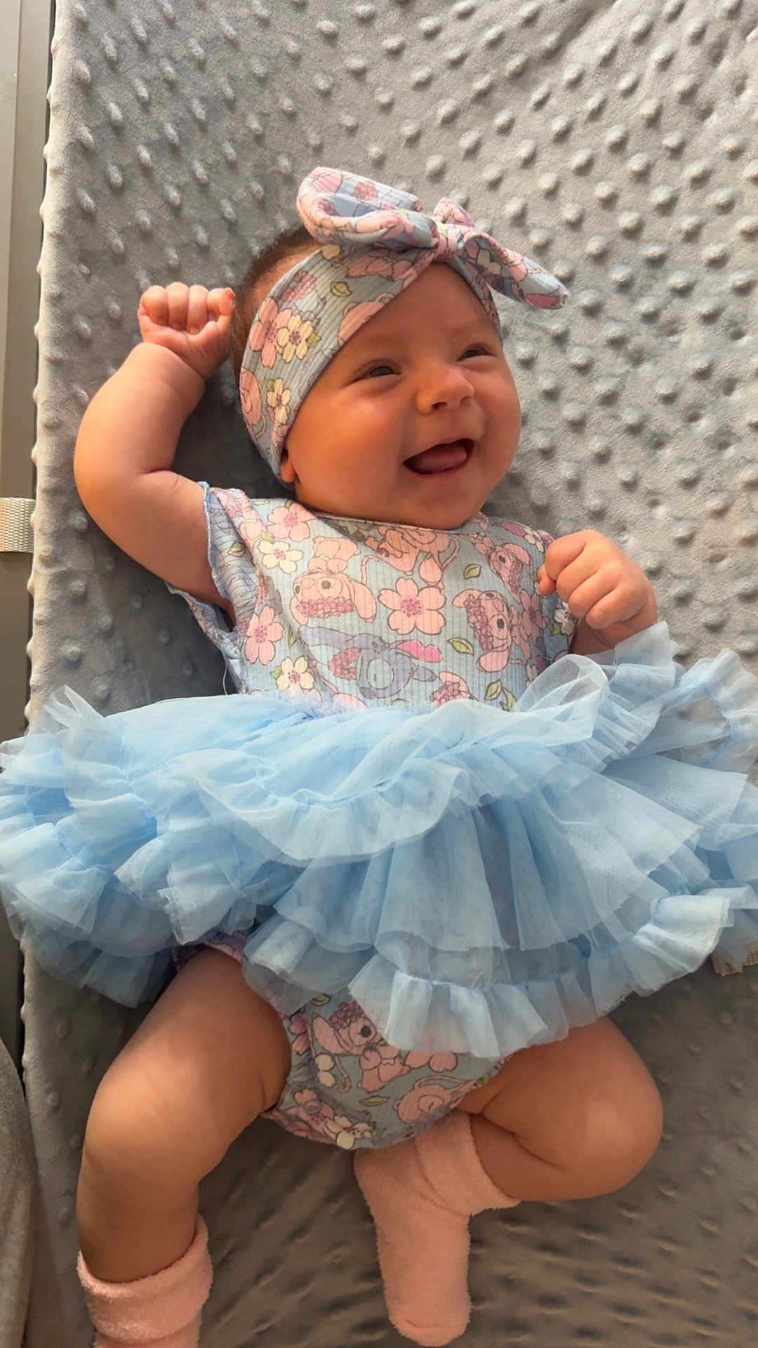 Amora joined the competition — help win amazing prizes! baby, smiling, tutu, blue, headband, floral, dress, sock, pink, cute, infant, happy, lying_down, fabric, texture, cheerful, child, soft, blanket, portrait