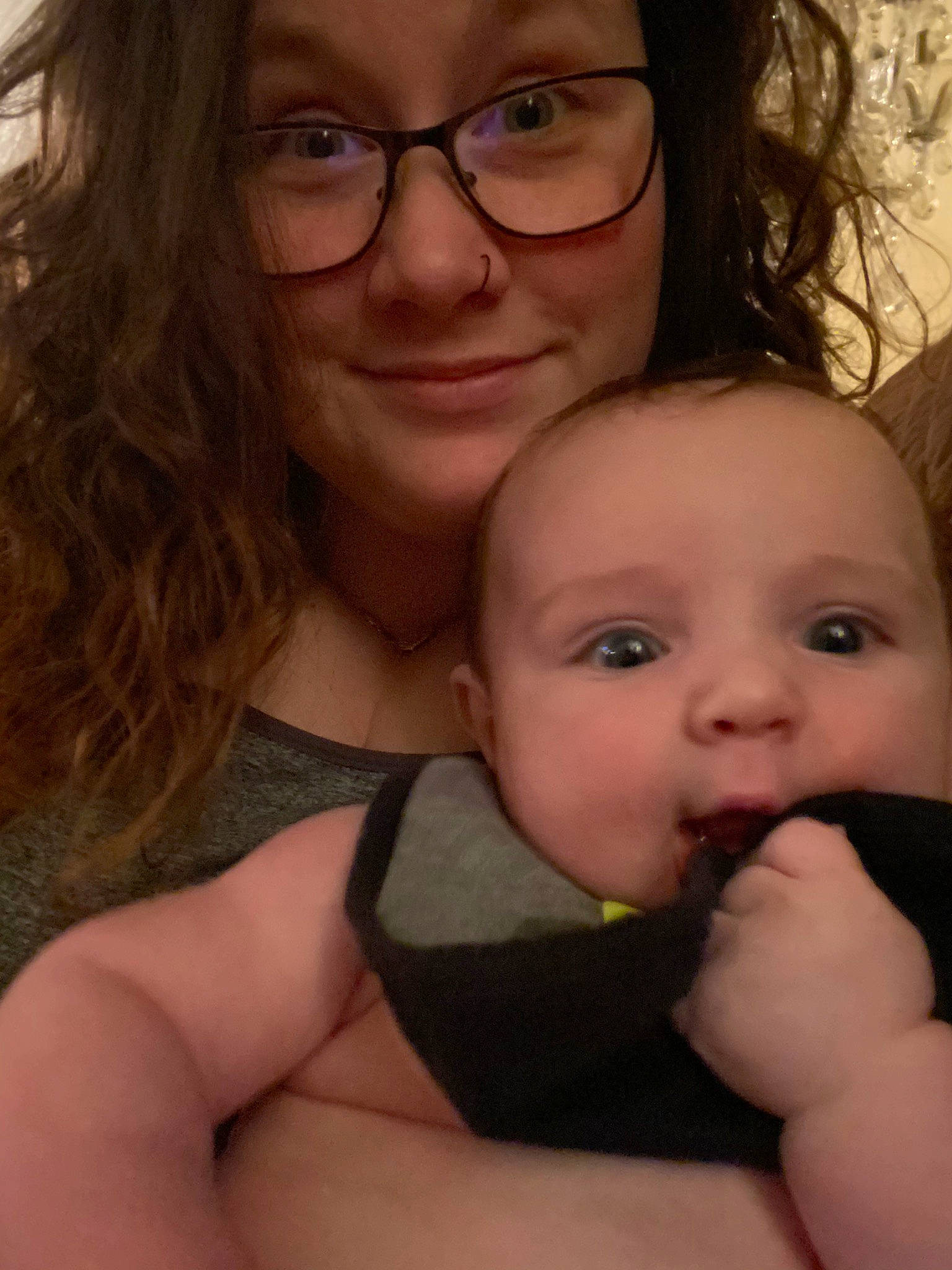 Alec is registered to the contest to win money with this photo: baby, cheek, child, eye, face, finger, fun, glasses, hand, head, joy, lip, mother, mouth, nose, person, photography, selfie, skin, smile