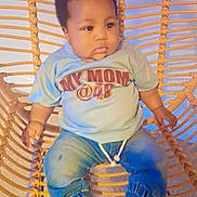 Flourish joined the competition — help win amazing prizes! baby, child, infant, blue_shirt, denim_pants, pink_shoes, woven_chair, indoor, balloons, cute, adorable, sitting, casual_clothing, portrait, young_child, expression, fashion, comfort, home, person