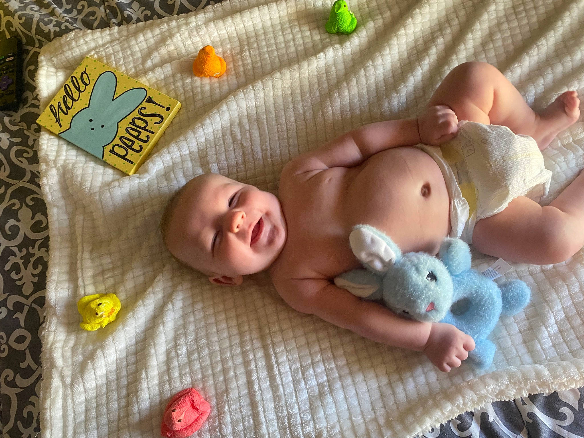 Blake joined the competition — help win amazing prizes! baby, baby_products, baby_sleeping, baby_toddler_clothing, cheek, child, comfort, eye, head, infant_bed, linens, pattern, person, product, skin, smile, textile, toddler, toy, white