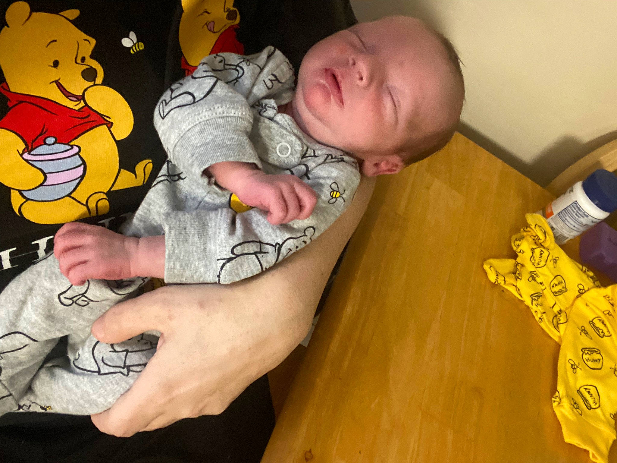 Blake is registered to the contest to win money with this photo: baby, baby_products, baby_sleeping, baby_toddler_clothing, bedtime, cheek, child, comfort, elbow, finger, flooring, foot, fun, mouth, person, room, sitting, thumb, toddler, wood