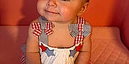 Clover joined the competition — help win amazing prizes! baby, child, infant, smiling, cute, dress, red, white, blue, stars, bows, sitting, pink_background, indoors, portrait, happy, skin, face, hands, feet