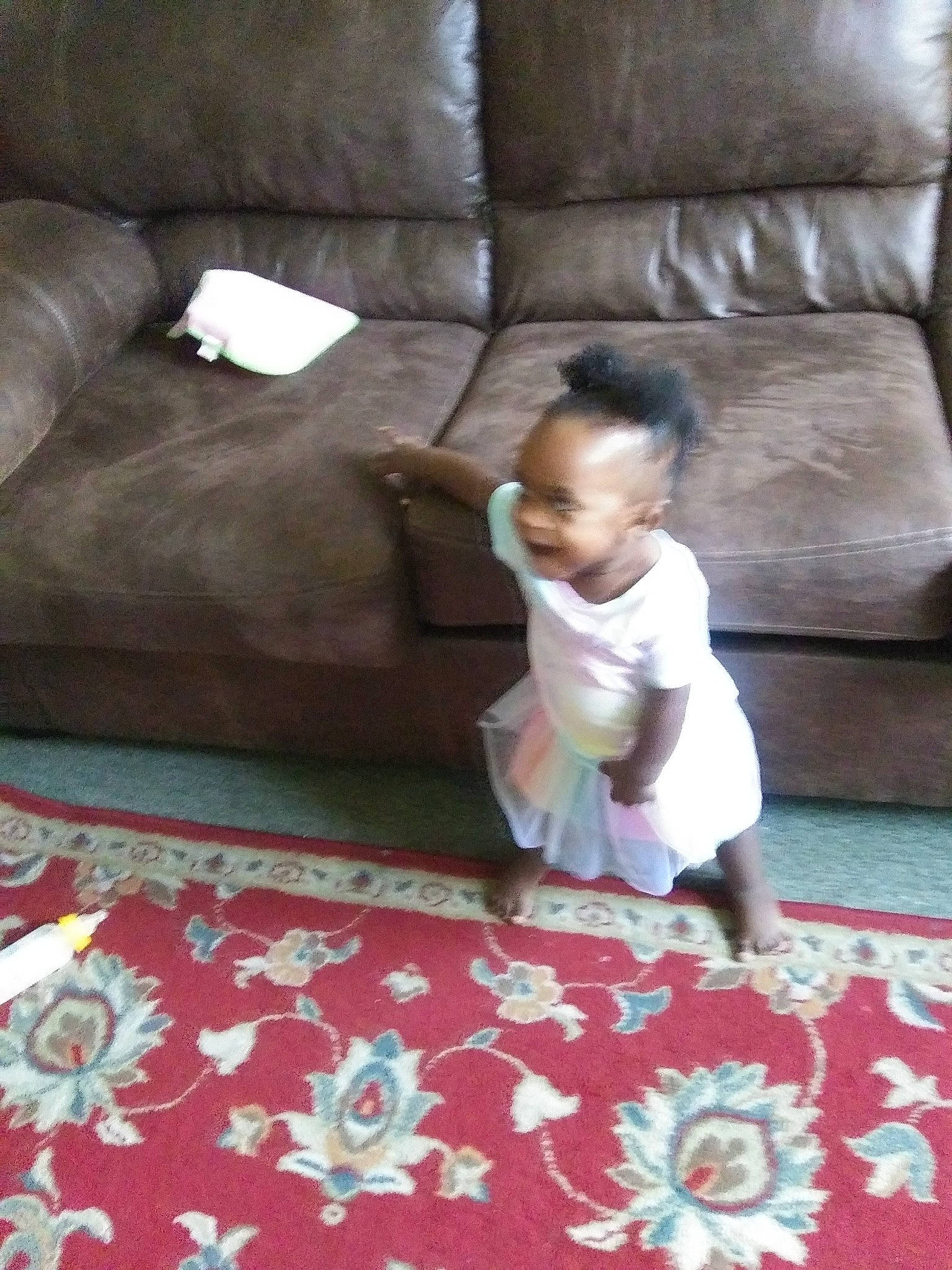 Kassidy joined the competition — help win amazing prizes! carpet, child, couch, floor, flooring, furniture, person, room, textile, toddler