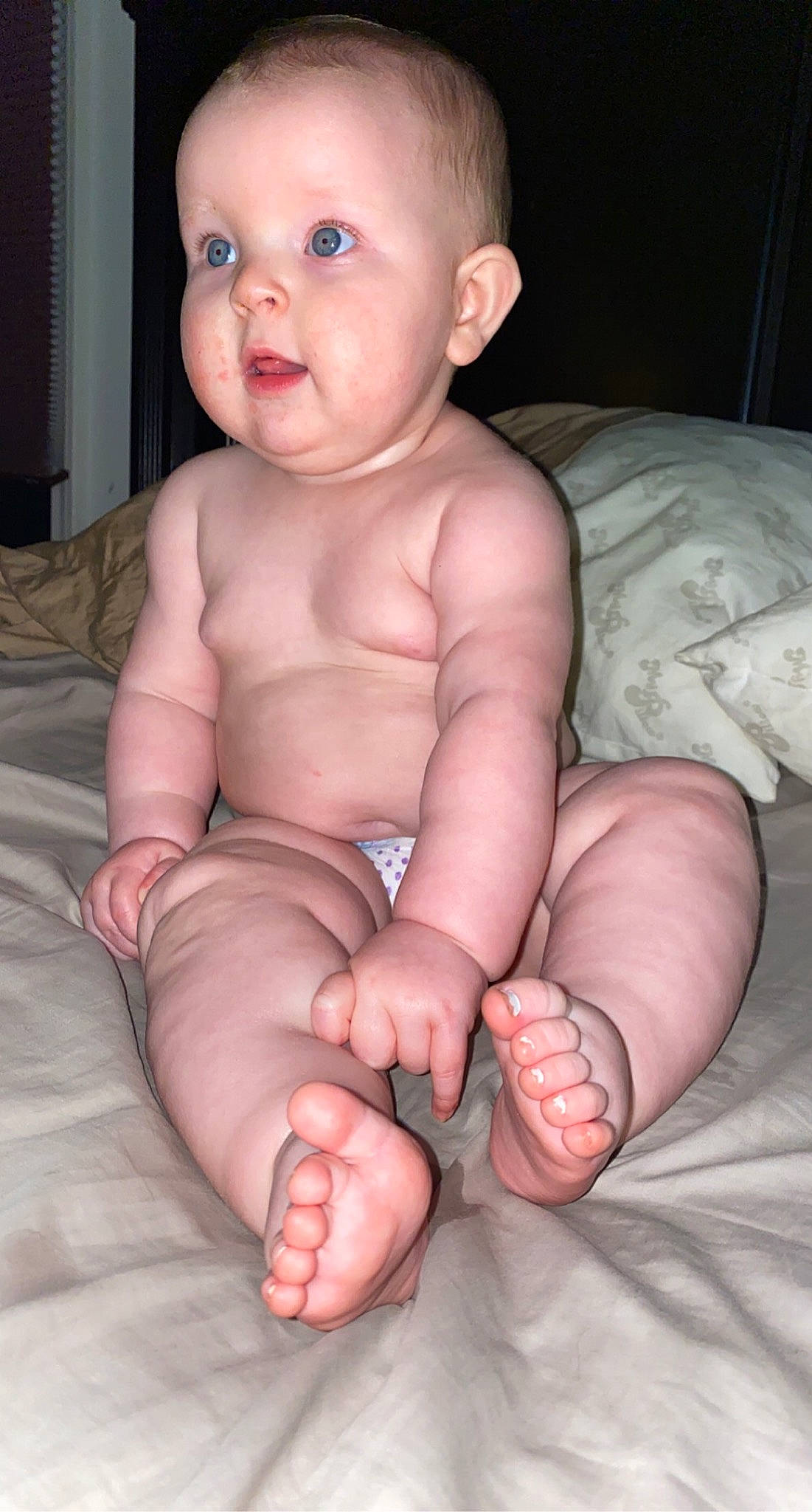 Gwendolyn is registered to the contest to win money with this photo: arm, baby, black, cheek, chin, comfort, eye, eyebrow, face, gesture, head, human_body, iris, lip, mouth, neck, nose, person, photograph, skin