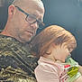 Piper is registered to the contest to win money with this photo: camouflage_shirt, casual_clothing, chair, child, closeup, comfort, family, glasses, hair, indoor, man, nap, natural_light, pacifier, peaceful, portrait, relaxation, rest, sleeping, toddler