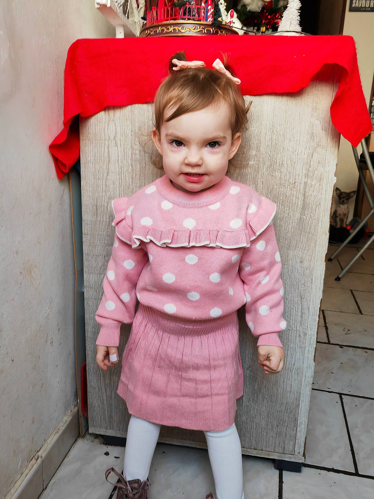 Cassidy participe au concours pour gagner de l'argent avec cette photo : baby_toddler_clothing, cheek, child, embellishment, event, eye, happy, head, holiday, linens, magenta, pattern, person, pink, red, sitting, sleeve, smile, toddler, toy